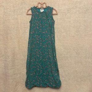 This is a green floral sleeping bag